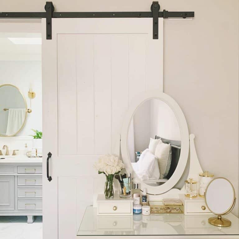 Attached Bathroom With White Sliding Barn Door
