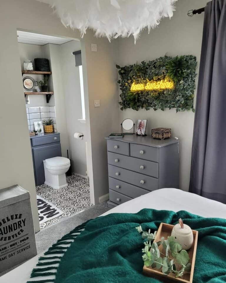 Attached Bathroom With White and Gray Mosaic Tile