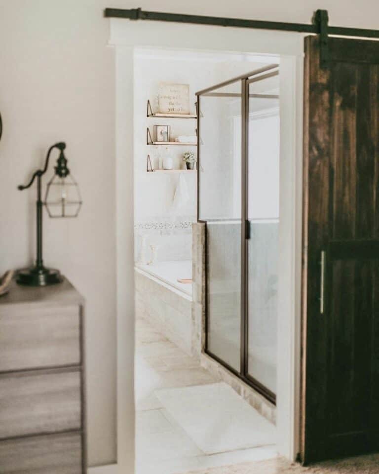 Bathroom With Dark Stained Wood Sliding Door