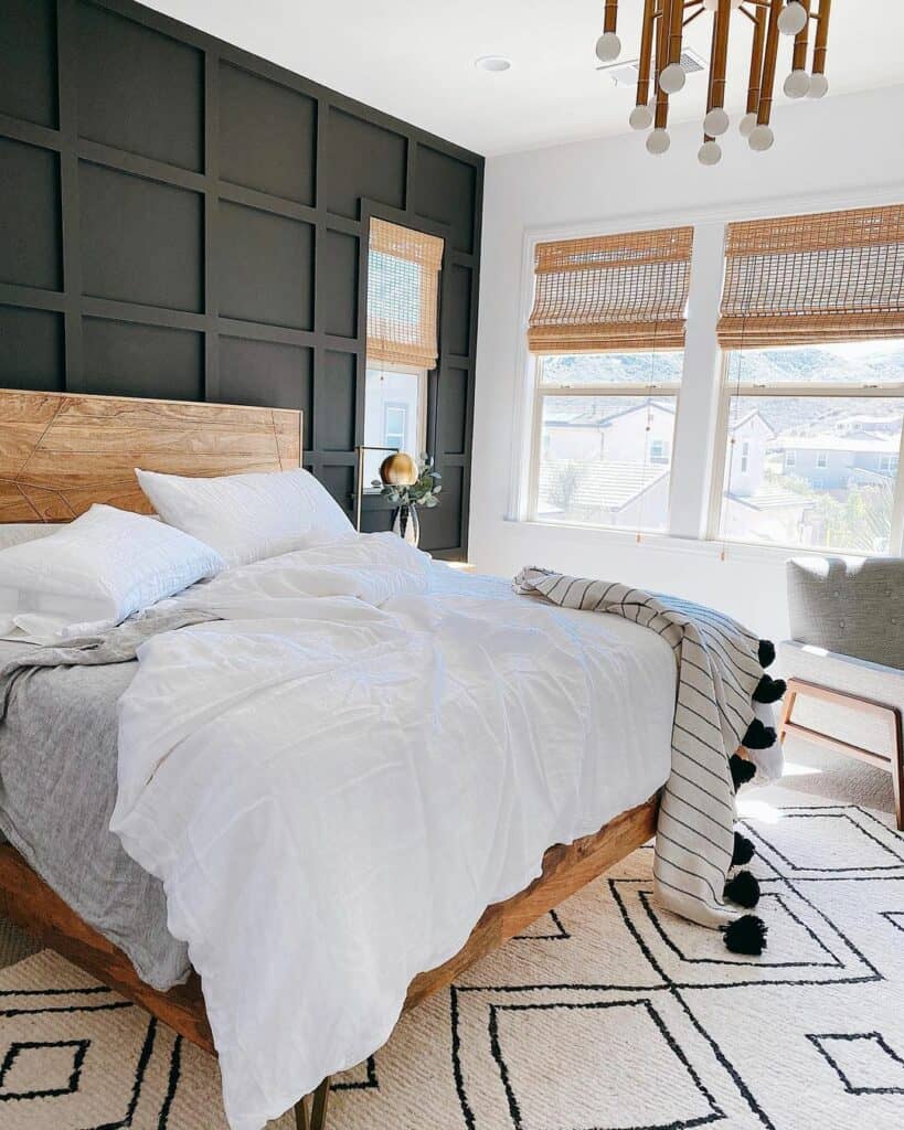 Black Accent Wall With Rattan Blinds in Bedroom - Soul & Lane