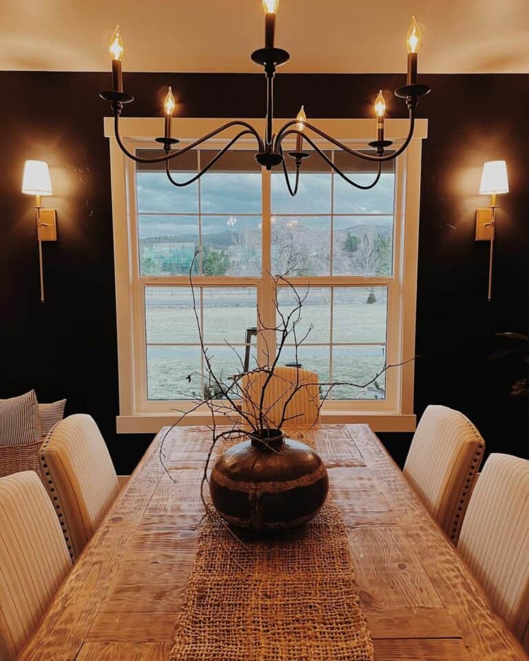 Black Accent Wall and Sconces in Dining Room