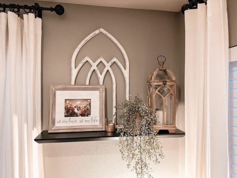 Black Shelf With Farmhouse Décor