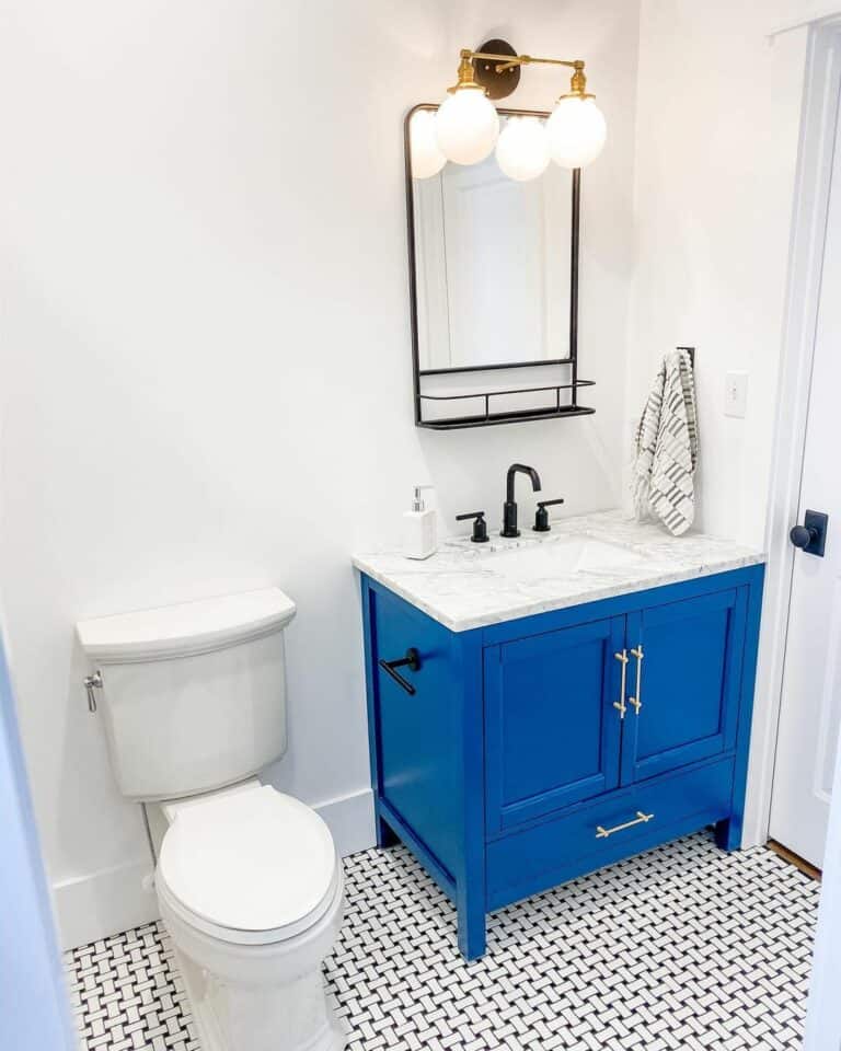 Blue Vanity and Basket Weave Tiles in Bathroom