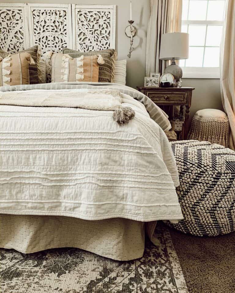 Boho Bedroom With Patterned White Headboard