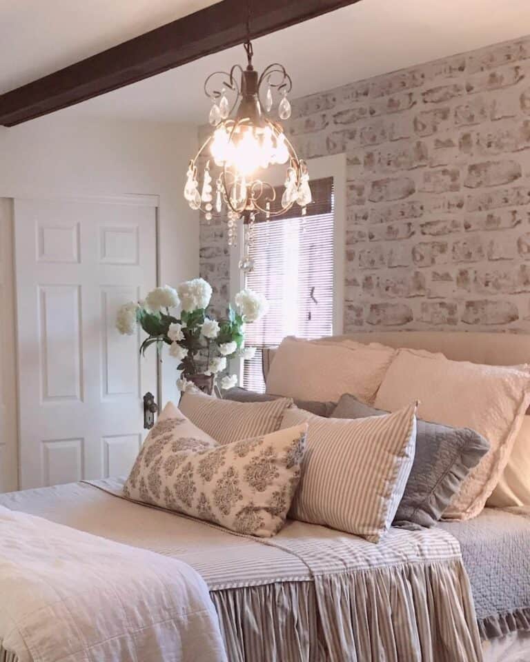 Chandelier Hangs From an Exposed Wood Beam