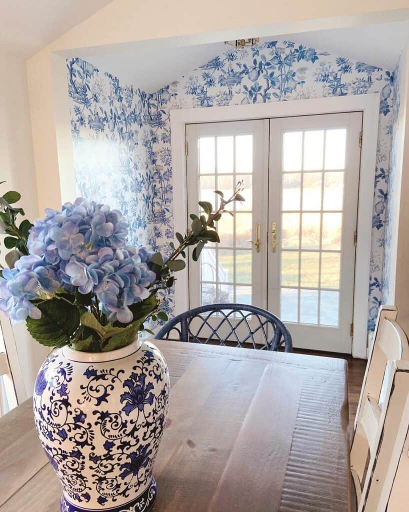 Coastal Dining Room With Floral Wallpaper