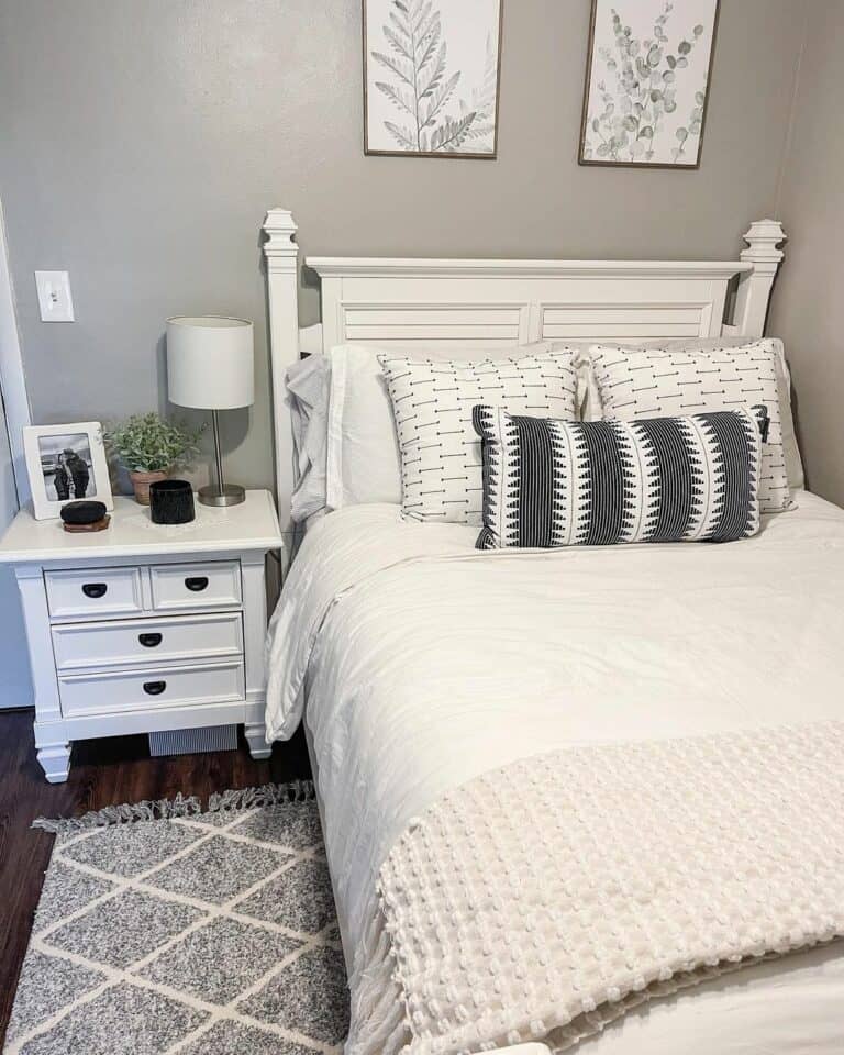 Cool-toned Gray Wall Paint for a White Farmhouse Bedroom