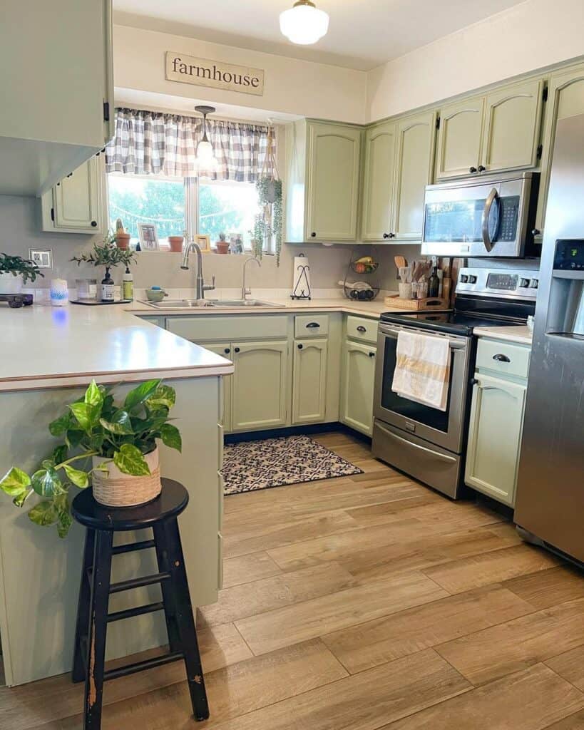 Cottage Kitchen With Green Cabinets