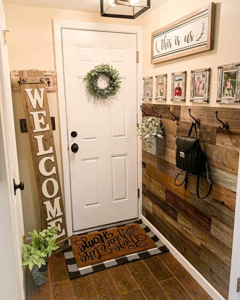Cozy Entry With a Rustic Wood Paneled Accent Wall