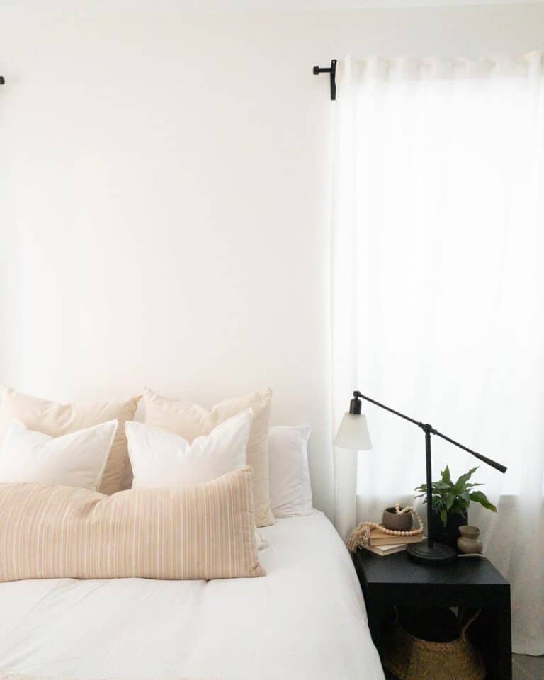Cream and White Pillows in Simple Bedroom