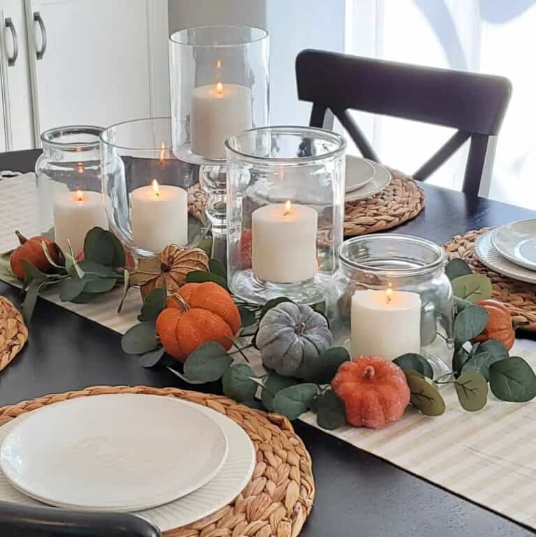 Dining Table Centerpiece With Candles and Pumpkins
