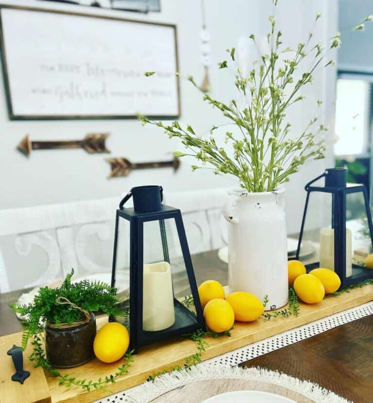 Dining Table Centerpiece With Lemons and Black Lanterns