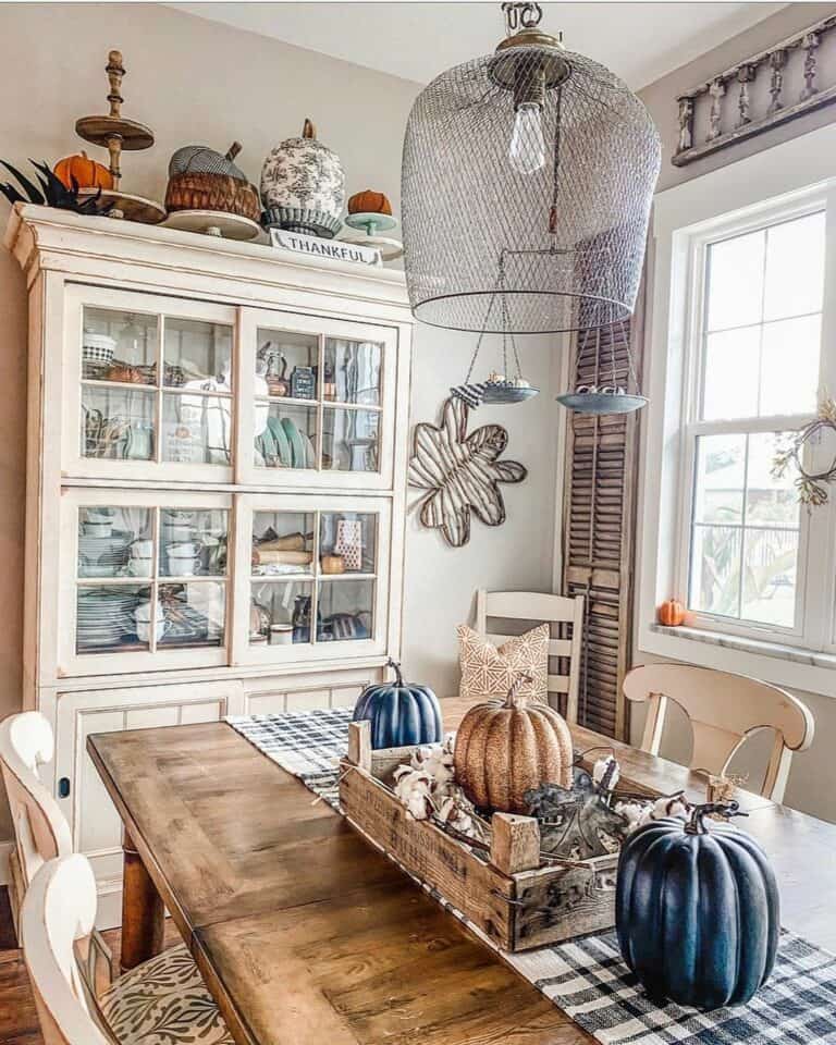 Dining Table With Blue and Gold Pumpkins