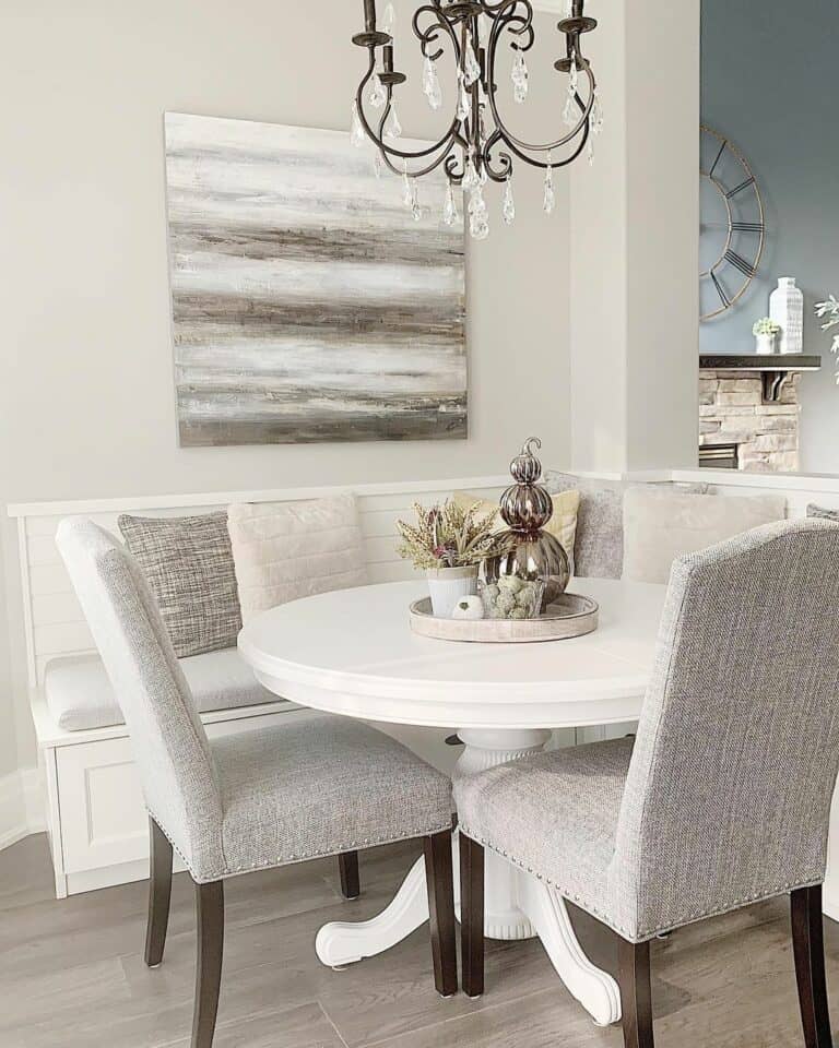 Elegant Dining Nook With White Banquette Bench