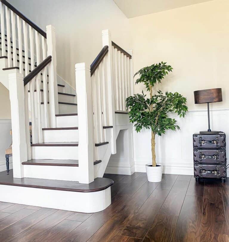Entry Hall Stairwell With Two-toned Balustrade