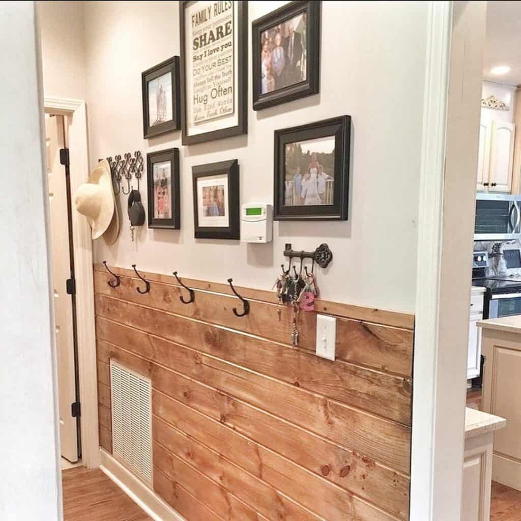 Entryway With Reclaimed Wooden Accents and a Gallery Wall
