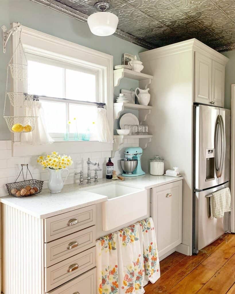 Farmhouse Kitchen With Floral Sink Curtain