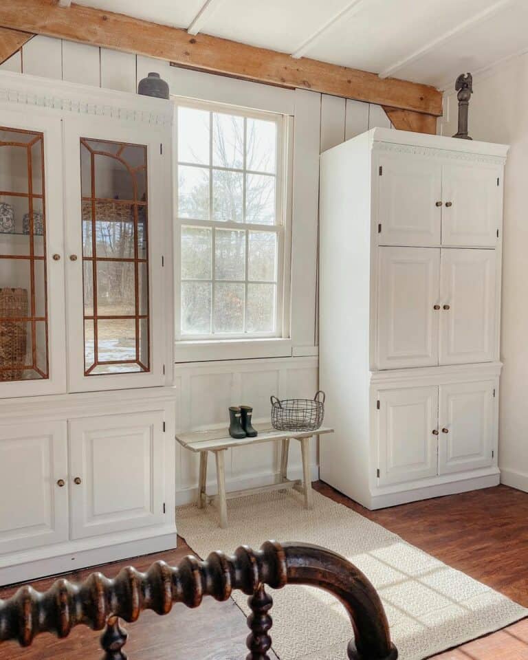 Farmhouse Mudroom With White Cabinets