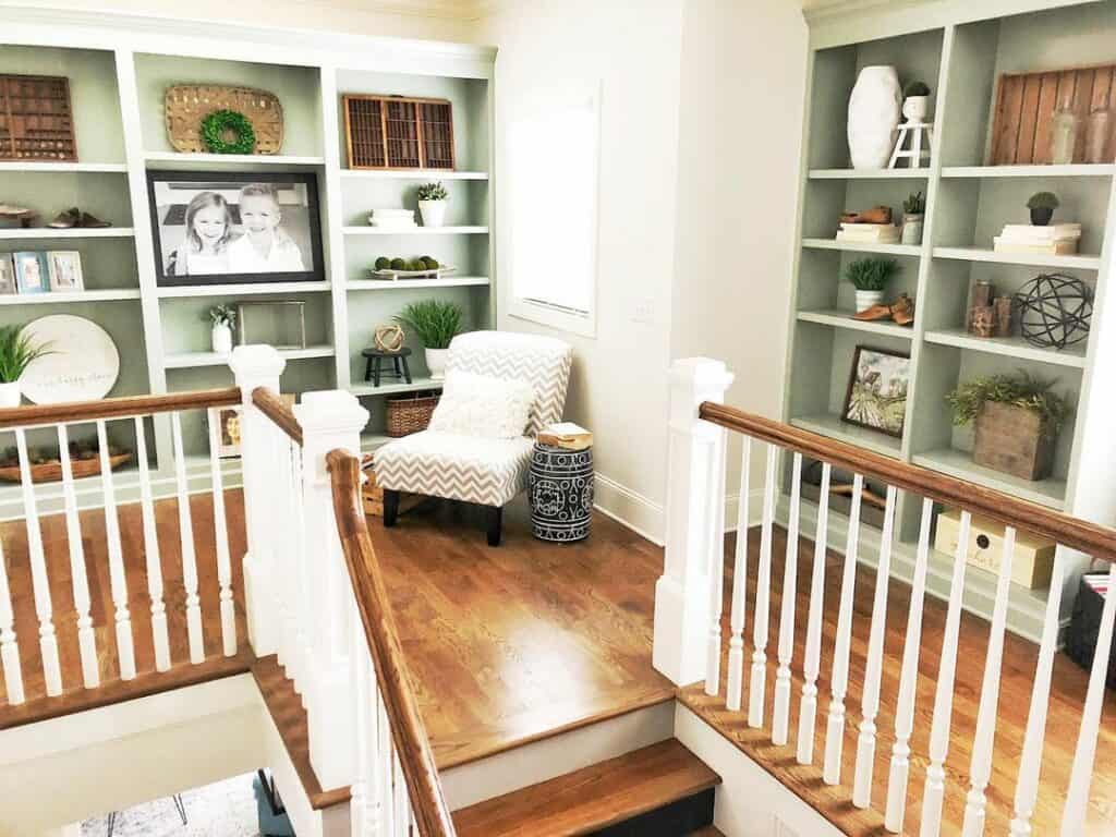 Farmhouse Stairwell With Gray Shelves