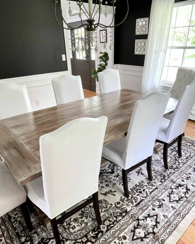 Formal Dining Room With Black and White Walls