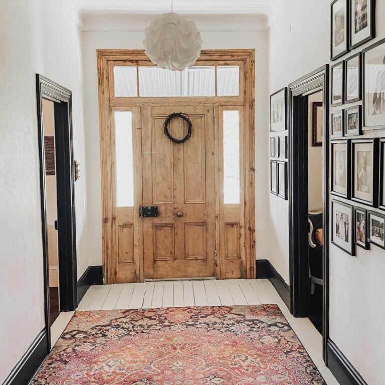 Gallery Wall Decorates a Rustic Entryway