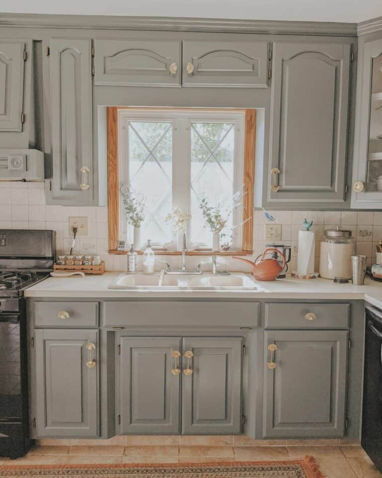 Gray Cabinets Adorned With Gold Hardware