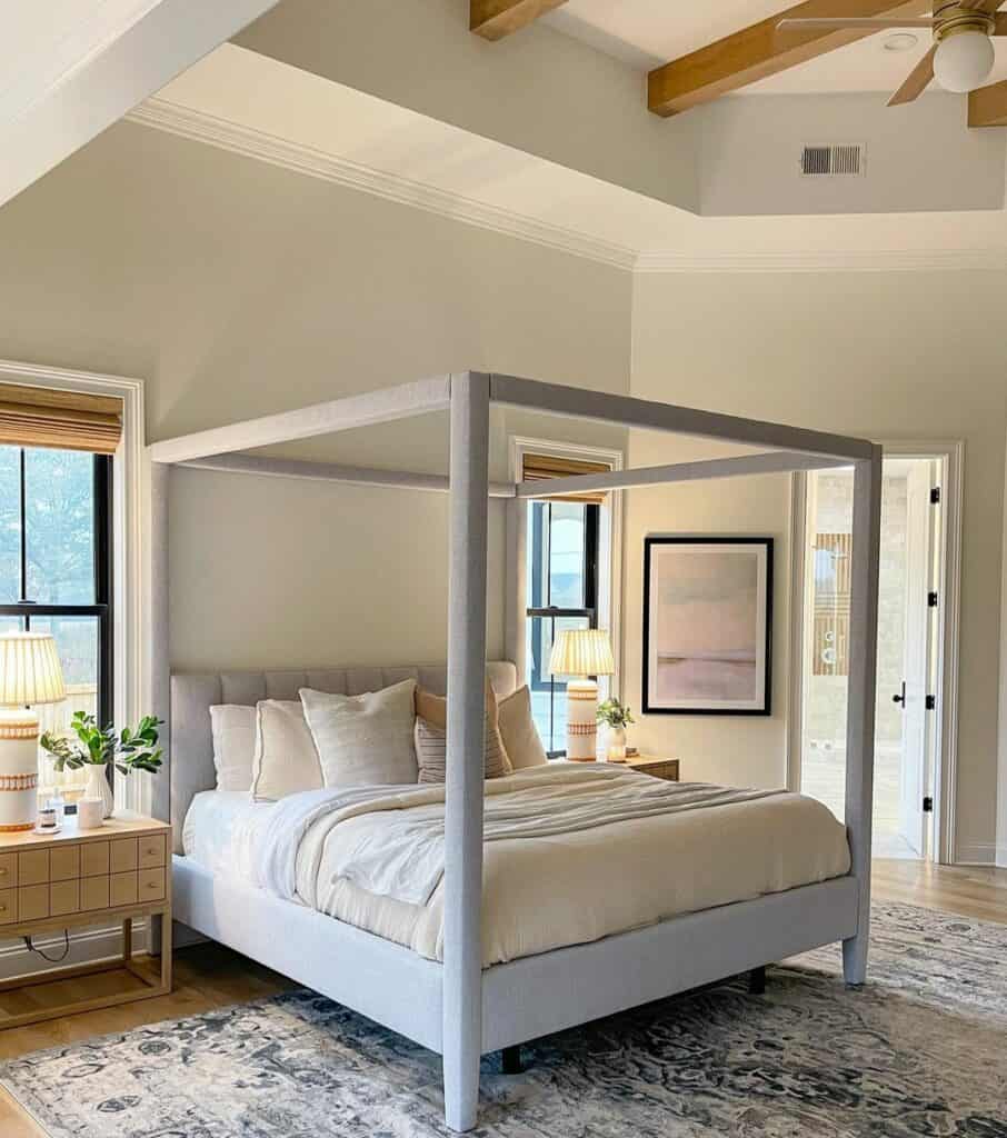 Gray Canopy Bed in Master Bedroom With Bathroom