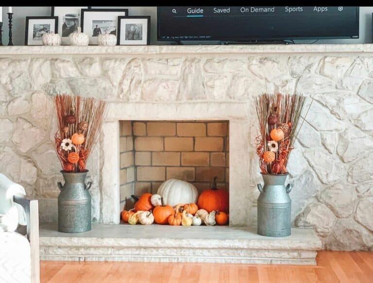 Gray Stone Fireplace With Pumpkins