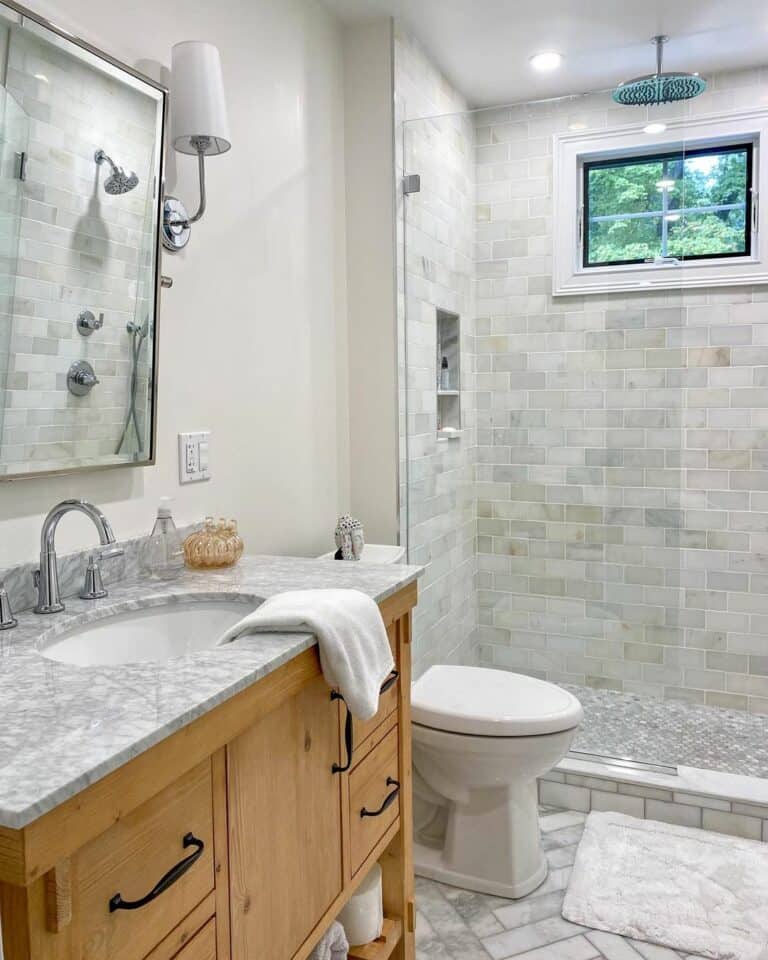Gray and White Three-quarter Bath With a Wood Vanity