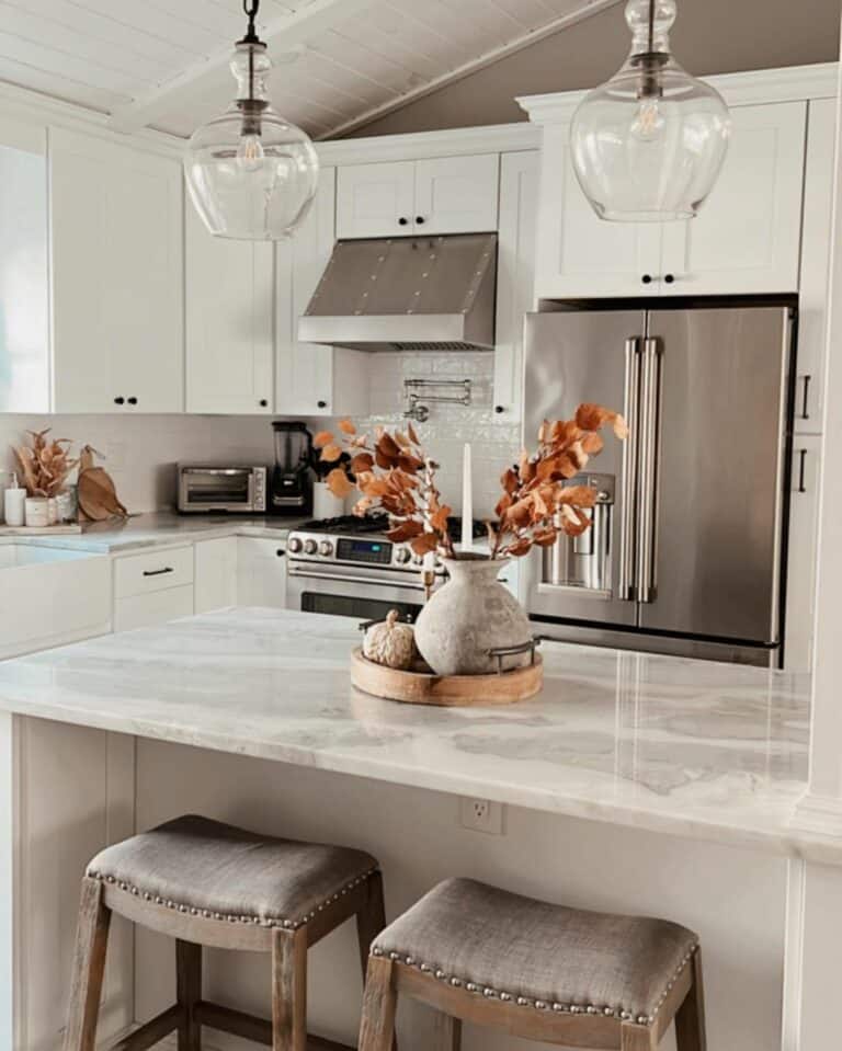 Kitchen With White and Gray Marble Countertops