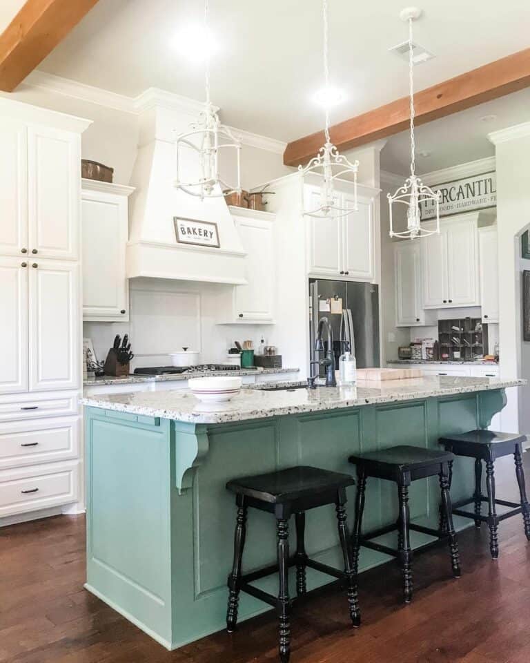 Light Blue Island and Tall White Cabinets