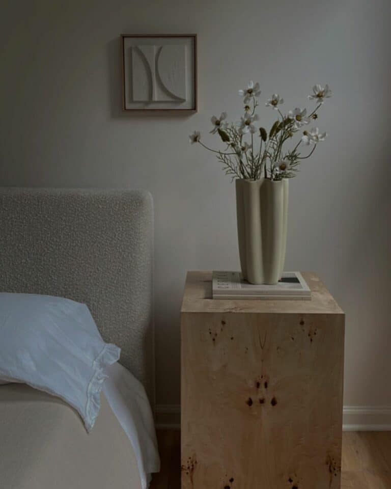 Minimalist Gray Bedroom With Natural Wood End Tables