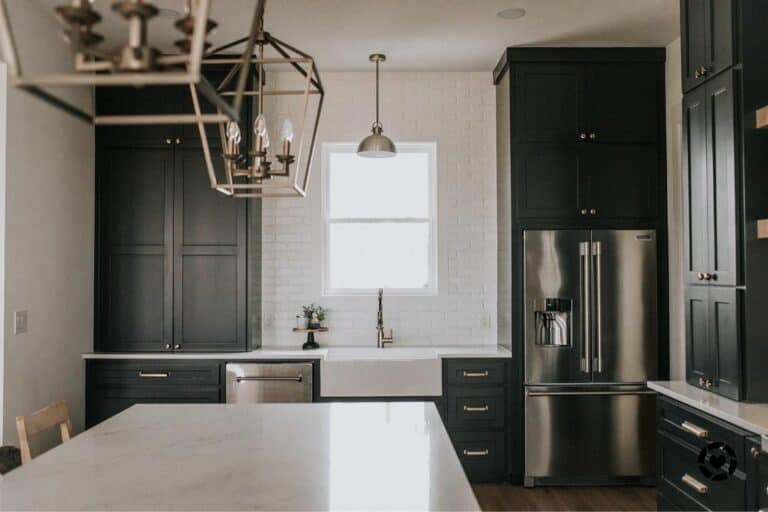 Modern Black and White Kitchen With Geometric Chandeliers