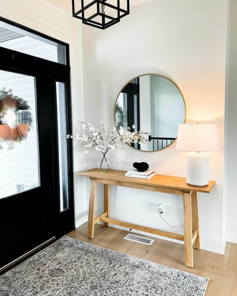 Modern Farmhouse Entryway With Black Front Door