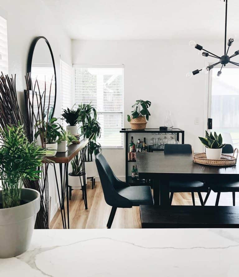 Monochrome Dining Room With Plant Décor