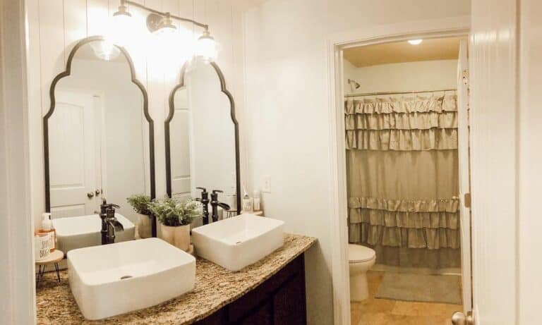 Neutral Bathroom With Granite Counter and Shiplap Walls