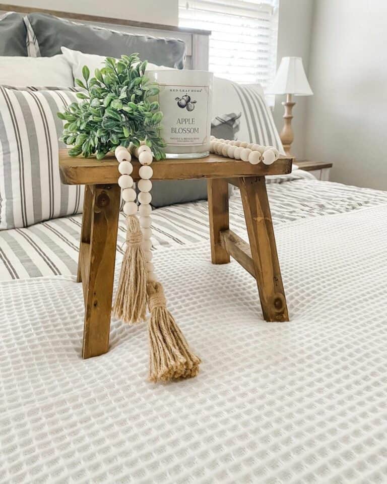 Neutral Farmhouse Bedroom With Gray Striped Bedding