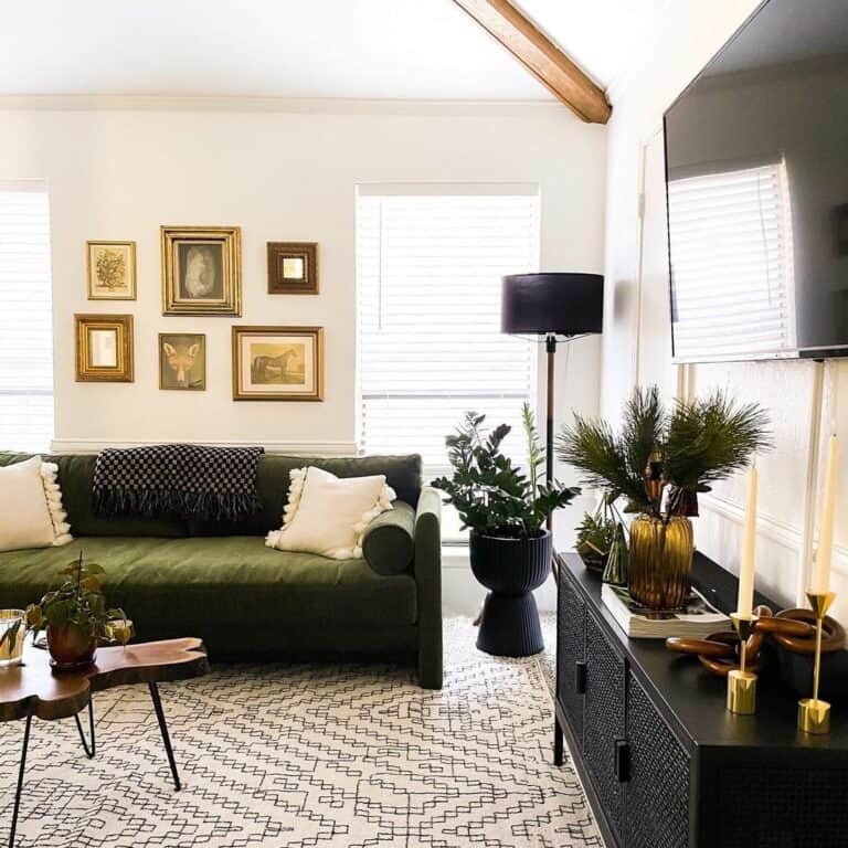 Olive Sofa With Vintage Artwork in Living Room