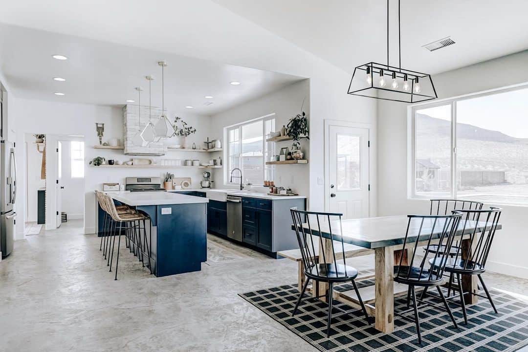 Open Kitchen Layout With Black Spindle Dining Chairs - Soul & Lane