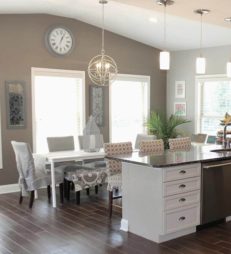 Open Kitchen With White Rectangular Dining Table
