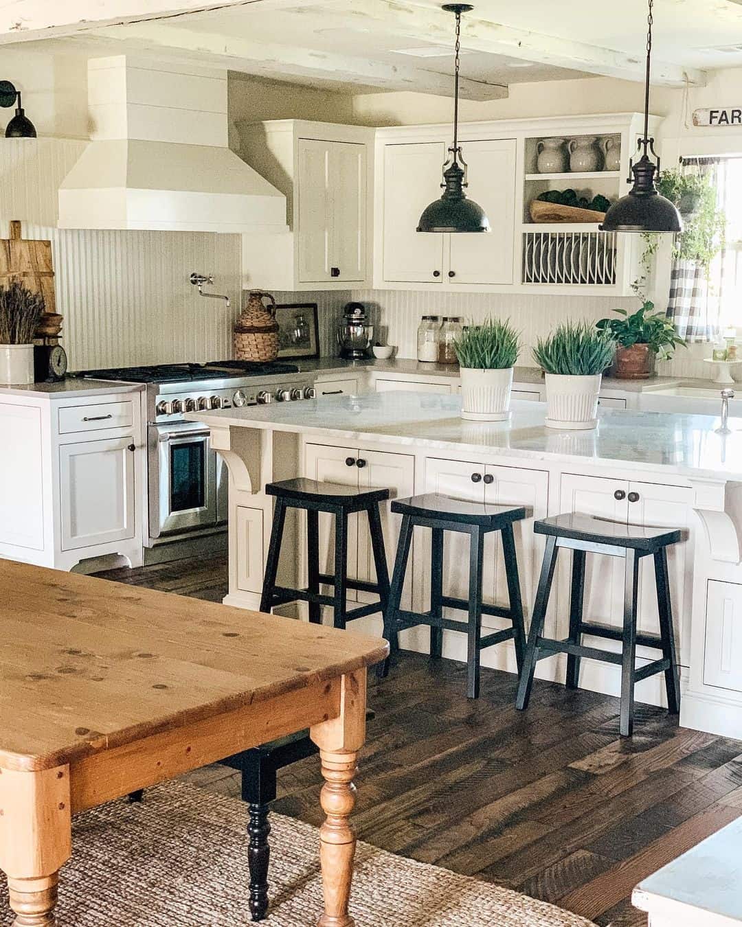 Open-concept Kitchen With Black Bar Stools - Soul & Lane