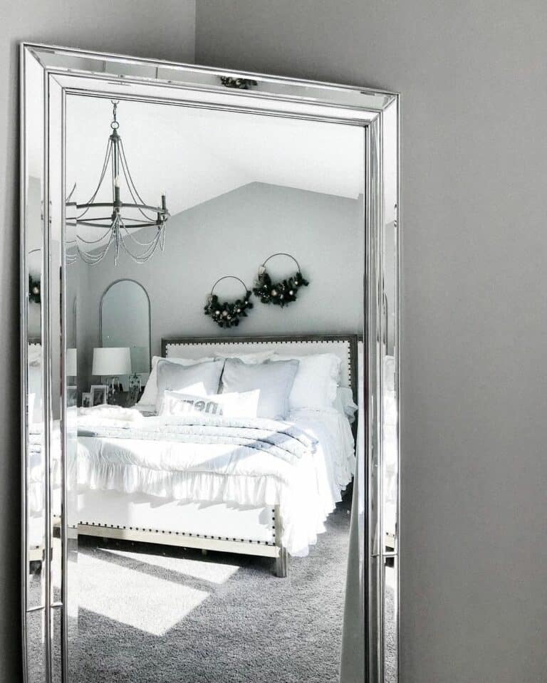 Organized Bedroom Reflected in Beveled Mirror