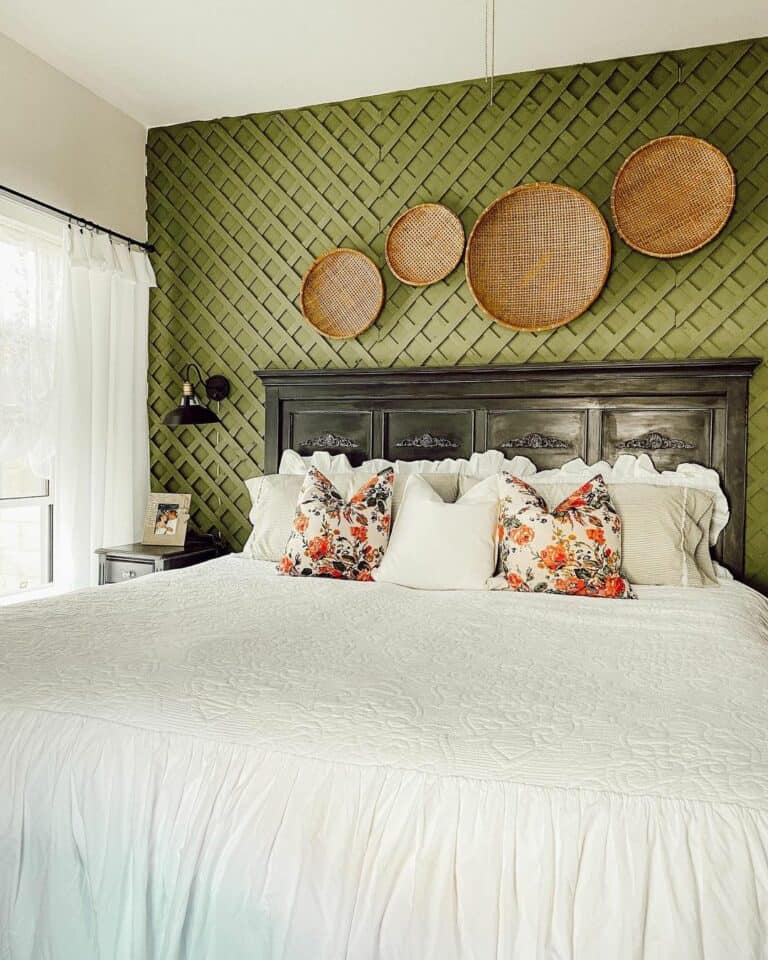 Patterned Olive Accent Wall With Floral Pillows in Bedroom