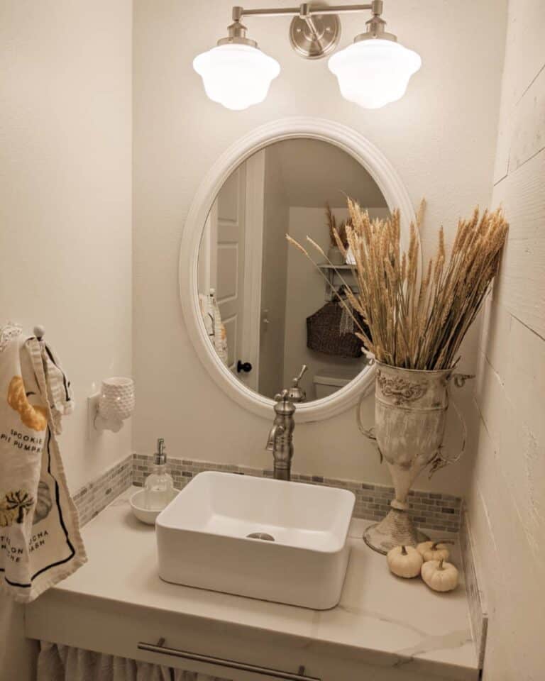 Powder Room With Oval Mirror