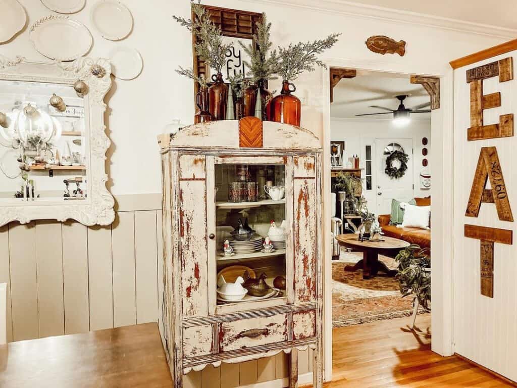 Reclaimed Dining Hutch With Amber Glass Vases