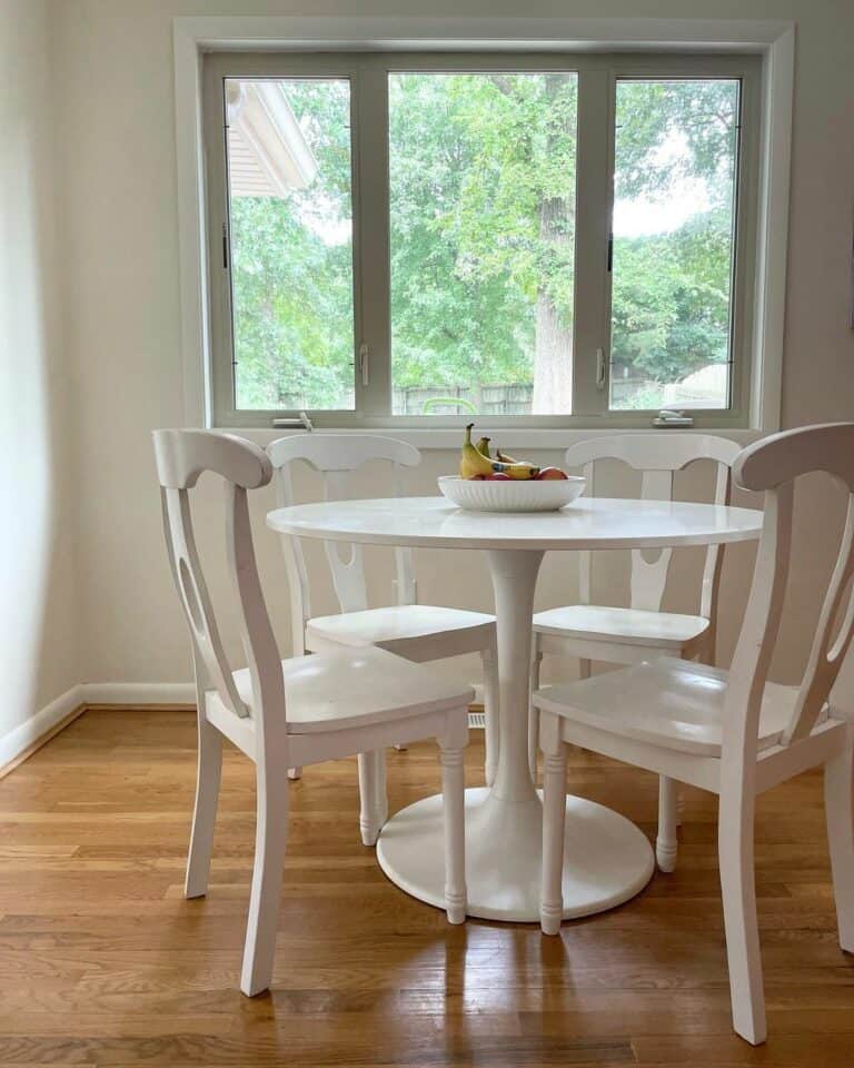Round White Dining Table With White Chairs