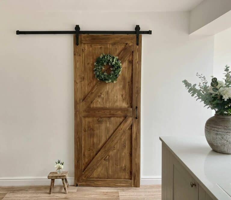 Rustic Door Displayed on a White Wall