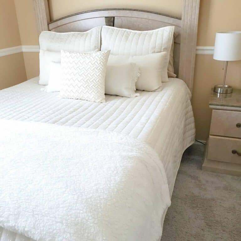 Simple Bedroom With White Mattress and Pillows