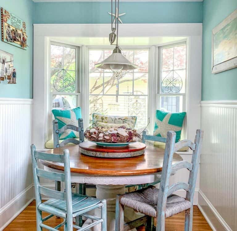 Small Blue Breakfast Nook With White Beadboard Trim