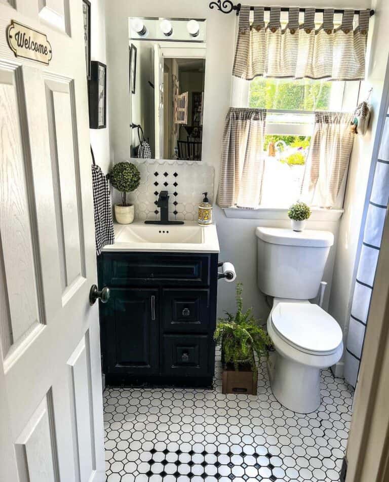 Small Farmhouse Bathroom With Black and White Floor Tiles